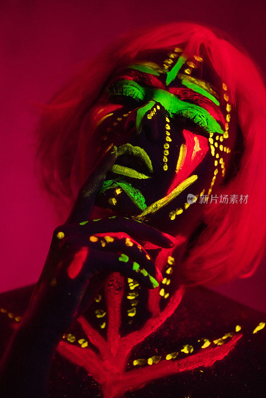 Young Woman With Fluorescent Makeup